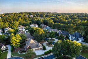 Aerial view of an upscale subdivision in suburbs of USA shot in HDR during Golden hour